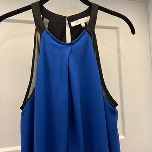 MIKA & GALI LINED SLEEVELESS DRESS. SIZE S.  100% Polyester. High/Low hemline.